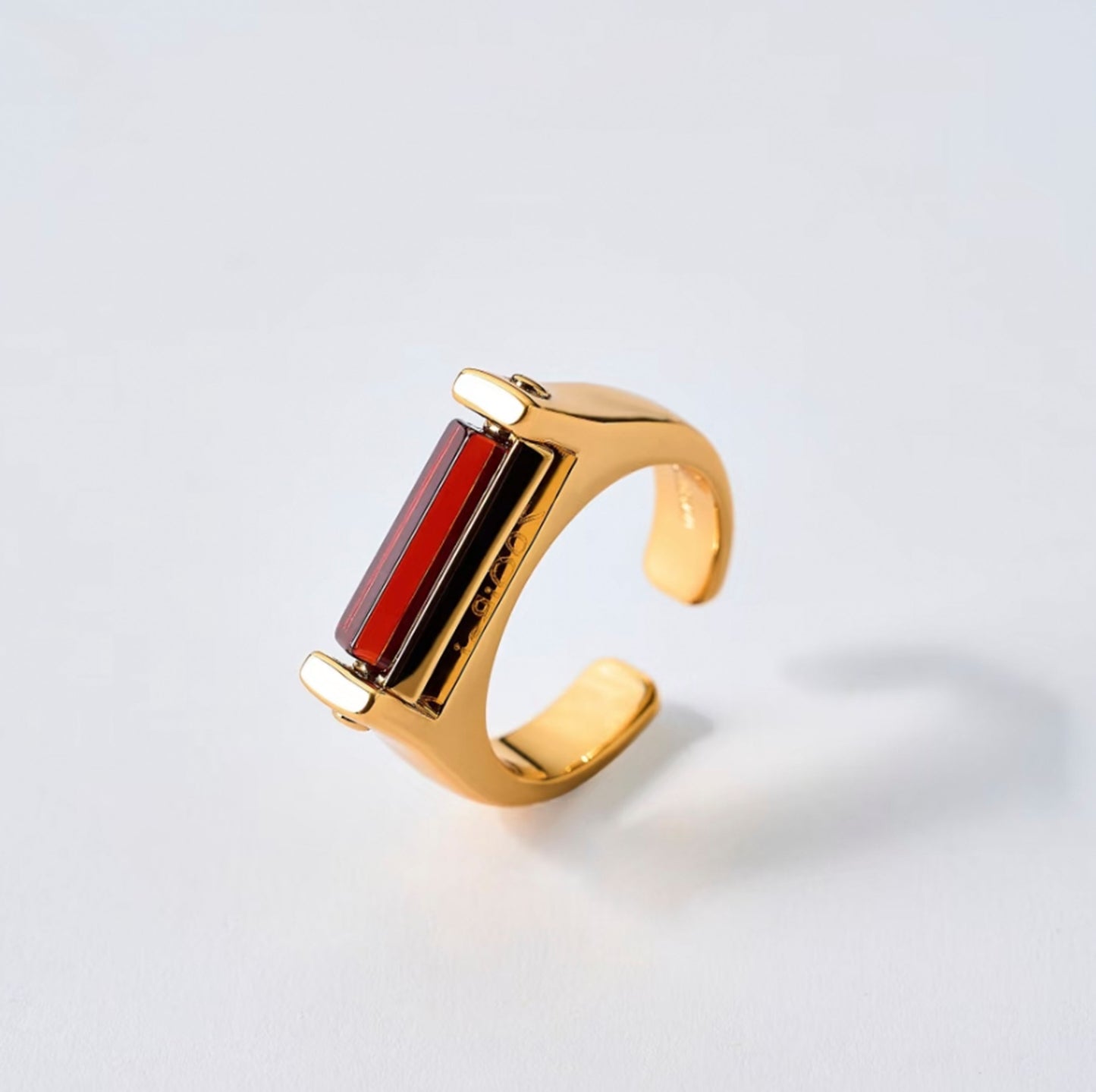 Gold Capricorn ring with garnet zircon by QiBai London
