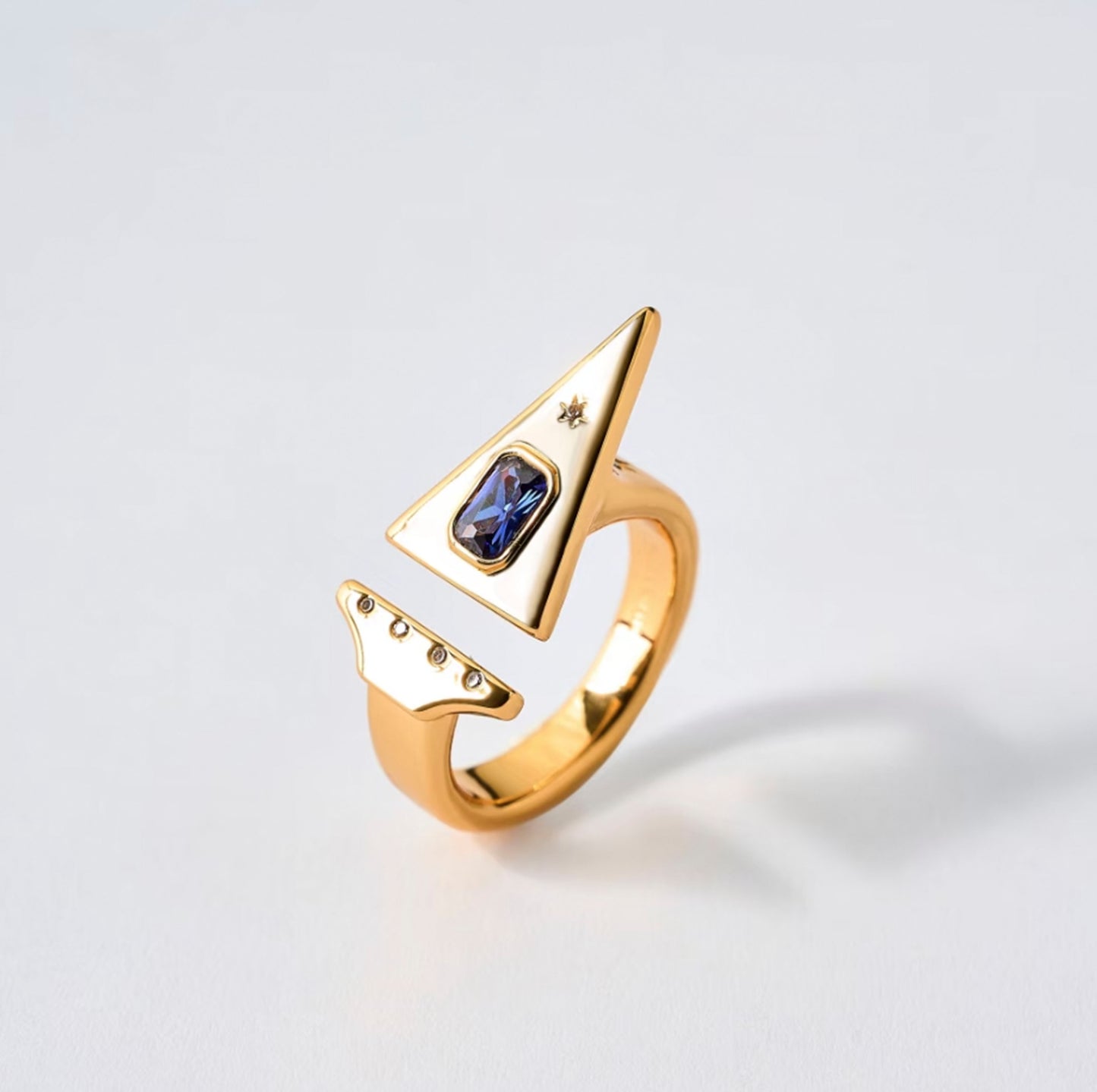 Gold Sagittarius ring with tanzanite zircon by QiBai London