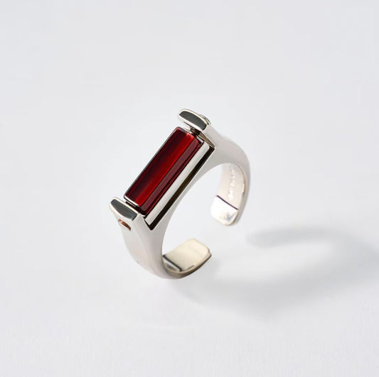Silver Capricorn ring with garnet zircon by QiBai London