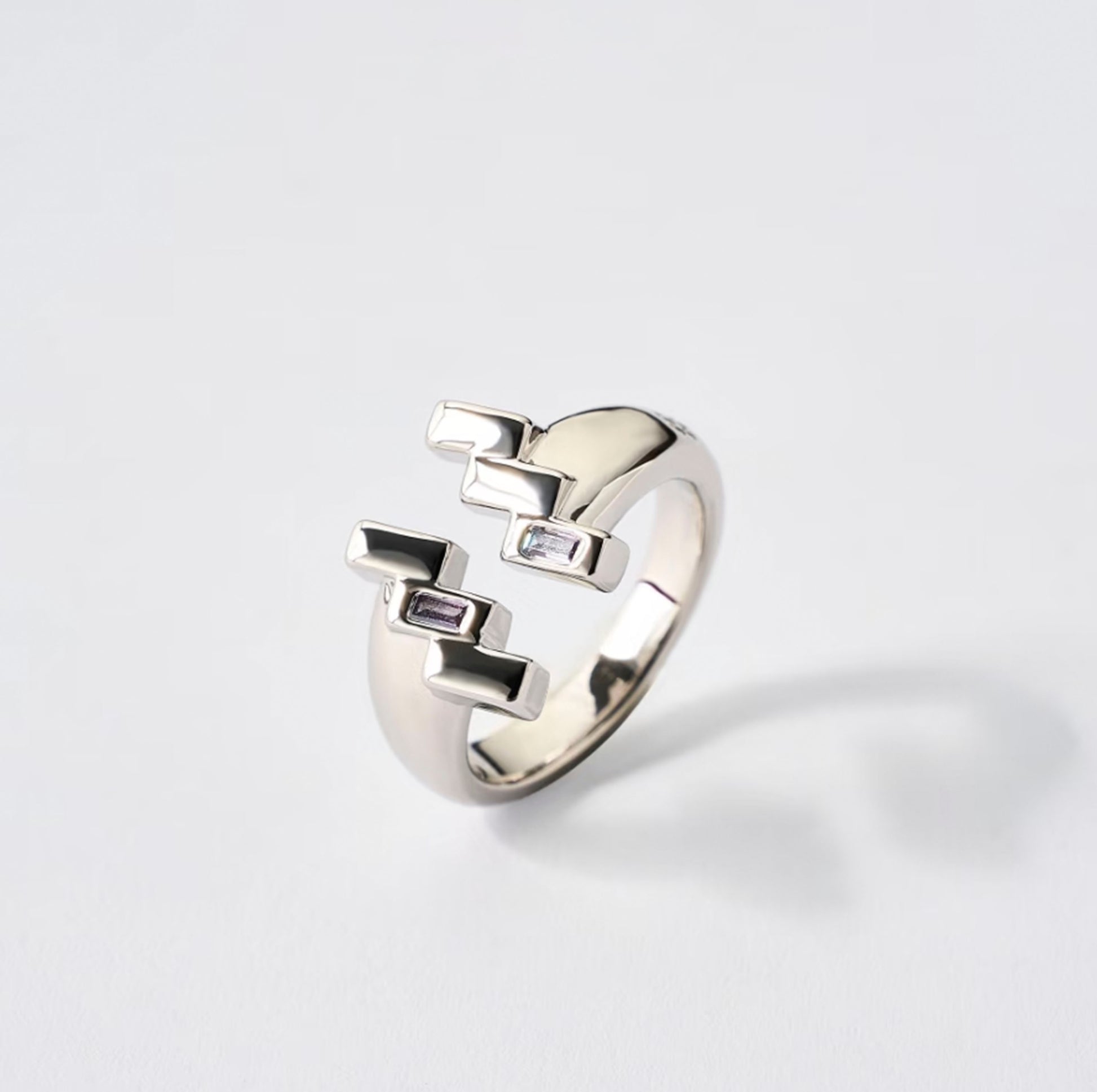 Silver Aquarius ring with tanzanite zircon by QiBai London