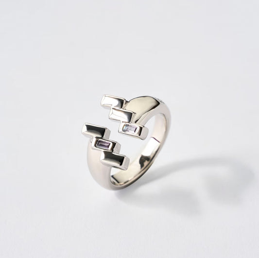 Silver Aquarius ring with tanzanite zircon by QiBai London